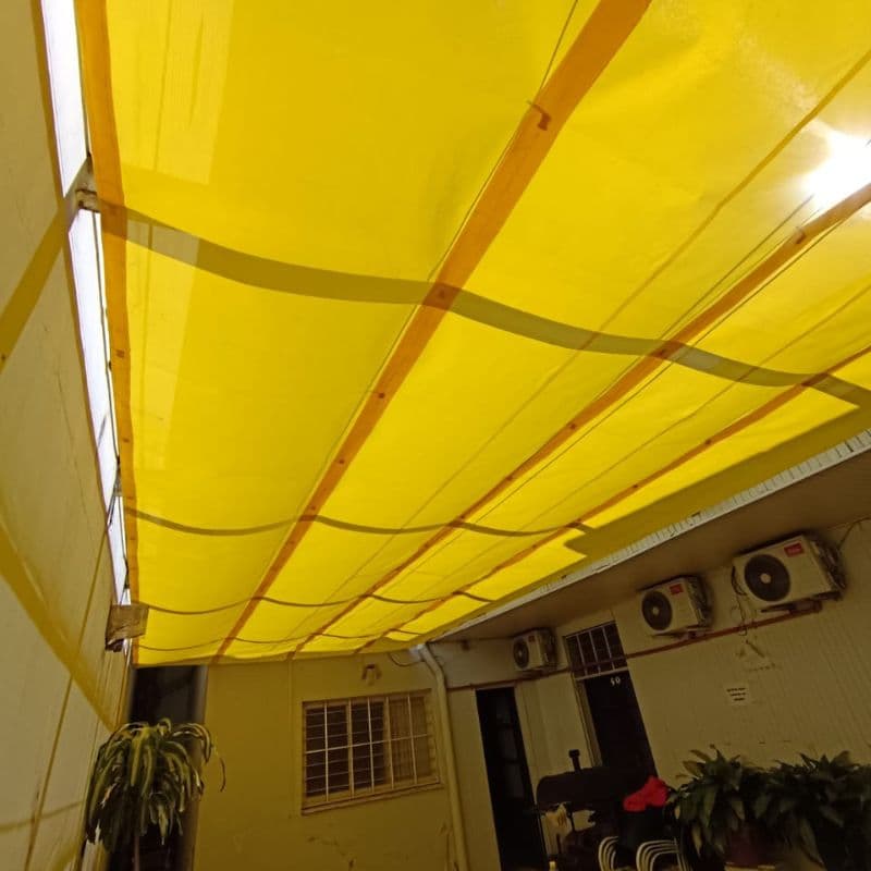 Toldo corredizo coversol tropical amarillo detalle techo lonera lider